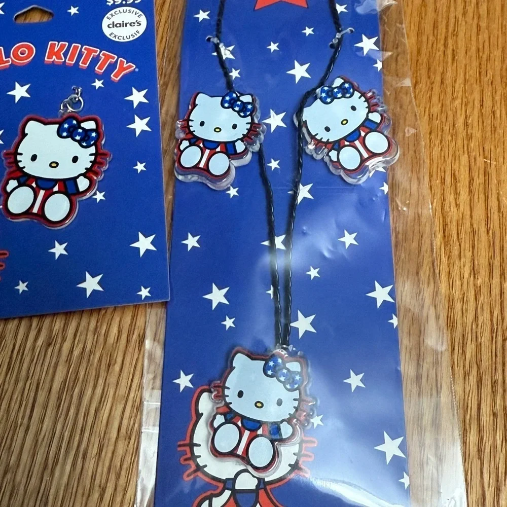 Claire's Hello Kitty Red White Blue Earrings and Light up Necklace set  NEW